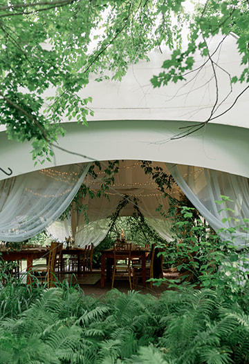 Tent entrance, wedding reception, seating, florals