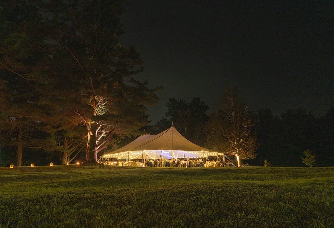 Wedding tent entrance, lighting, outdoor wedding venue