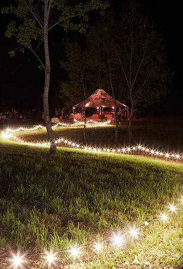 Tent, walkway, wedding reception, lighting, outdoor wedding