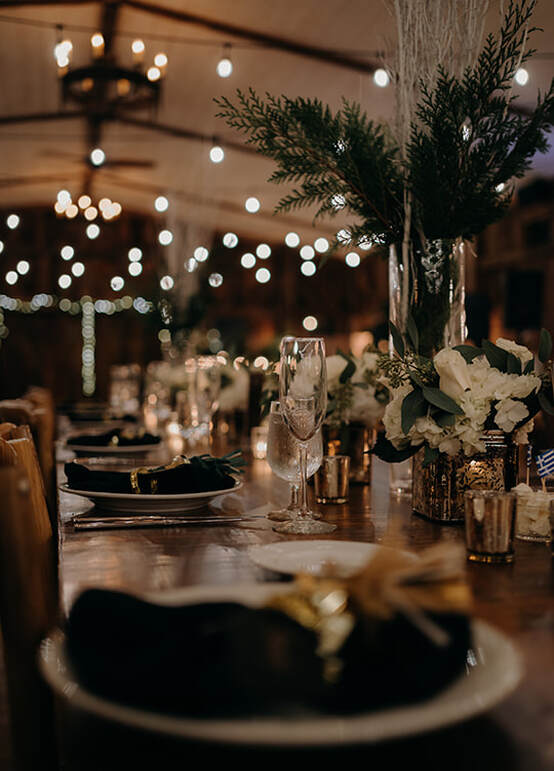Tent, place setting, tablescape, glassware, florals, wedding reception, champagne flute