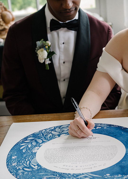 Wedding couple portrait, bride and groom, signing marriage certificate, 