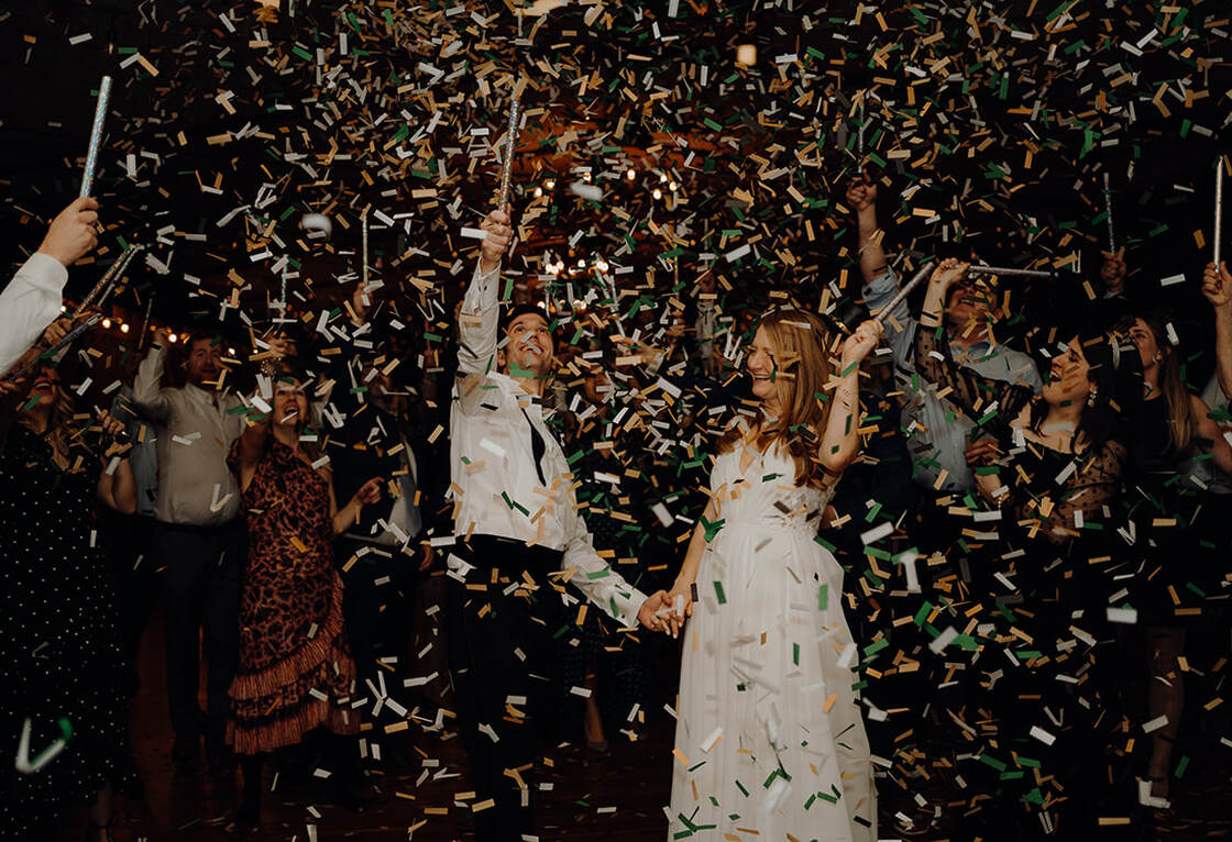 Wedding reception, confetti, bride and groom, after party