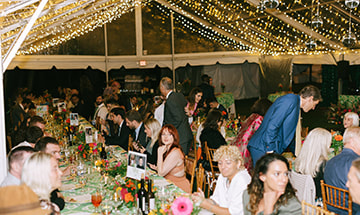 Wedding reception, seating, guests, tent, lighting