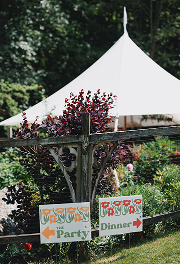 signage, wedding reception, outdoor wedding