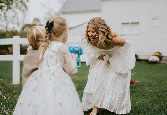 kids, guests, bubbles, wedding ceremony, outdoor wedding