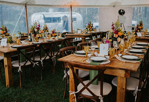 Seating, glassware, flowers, wedding reception, tent, tablescape