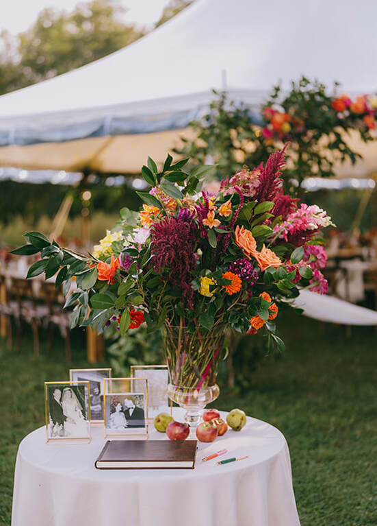 Wedding reception, tablescape, flowers, pictures, tent