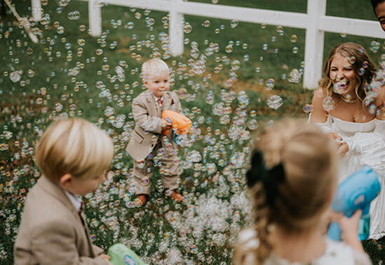 kids, guests, bubbles, wedding ceremony, outdoor wedding